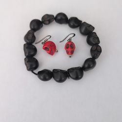 A skull bead bracelet and earrings set
