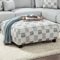 New In The Box Bobkona Cocktail Upholstery Ottoman Off white beige brown color see last 4 pictures 