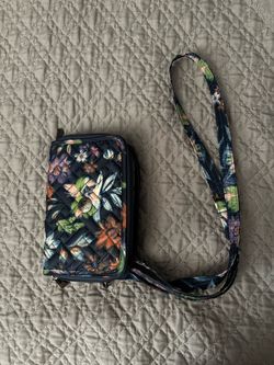 Multifunctional quilted wallet/bag with wrist strap