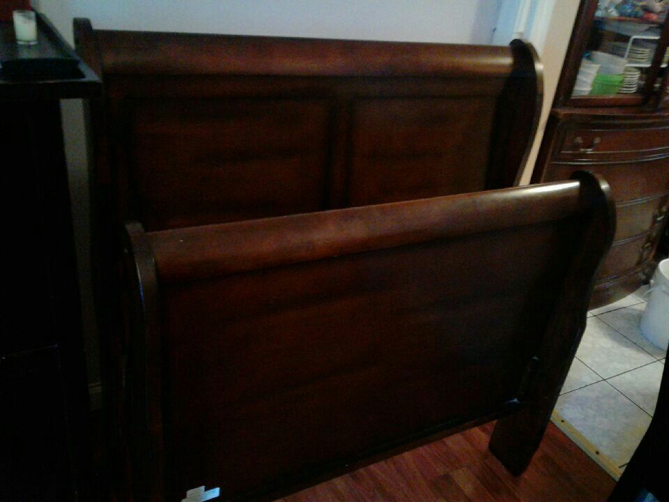 Twin bed like new dark brown color