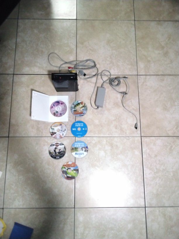 Wii Comes With 1 Controller, And 8 Games