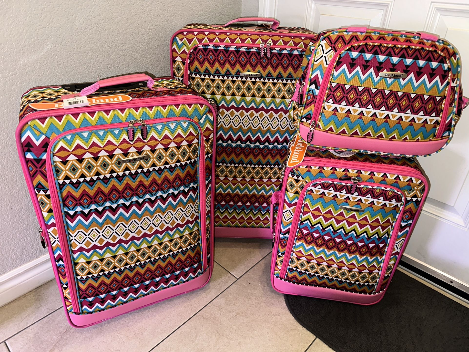NEW 4-Piece Travel Luggage Set Rolling Suitcase Softside Checked-Carry On