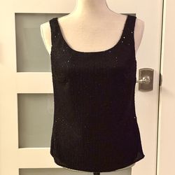 Tahari black sequined blouse top, ideal for special occasions, its design features a round neck and a shiny fabric that subtly catches the light