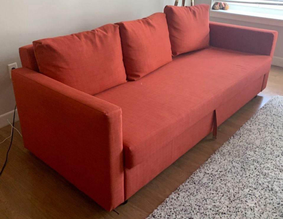 IKEA FRIHETEN SOFA PULL OUT ORANGE COUCH WITH STORAGE