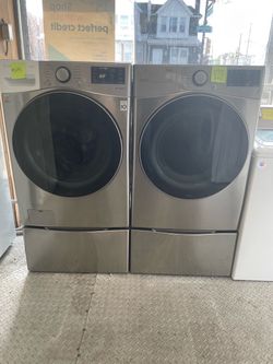 LG 27” Thin Q Fromt Load Washer and Gas Dryer with Removable Pedastals