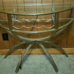 Glass sofa table with wine holders