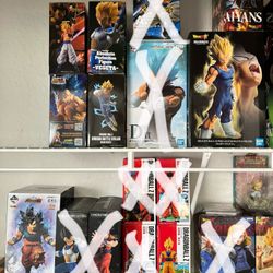 Assorted Dragon Ball Z Figures, Statues, And Gashapons 