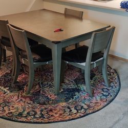 Painted wooden dining table + Extension + 4 matching chairs + Rug