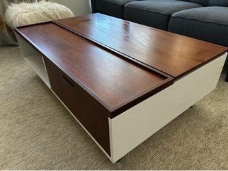 Swing top table with storage bin and drawer
