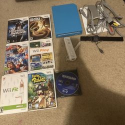 Blue Nintendo Wii Console With 7 Games