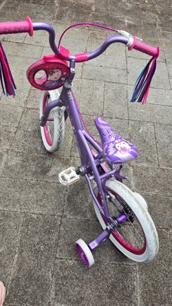 Hello Kitty bicycle with trainer wheels