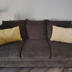  Couch Dark gray, like new, hardly used, no tears or stains.