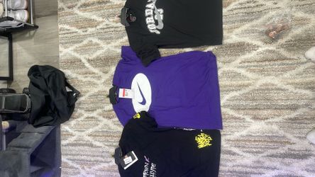 Kids Jordan Nike shirts and other with price tags kids size 14 large size 14 large and 10