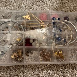 A Bunch Of Bracelets And Earings