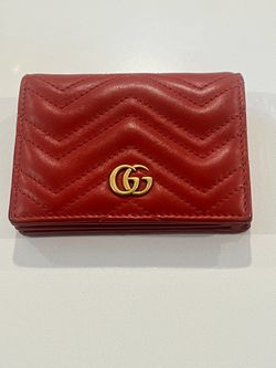 Red Gucci GG Marmont wallet with gold hardware