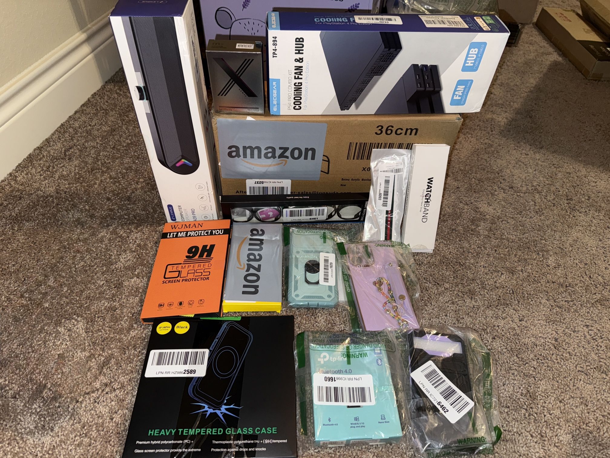 Tech bundle- includes headphone amplifier, speaker, phone cases, Bluetooth adapter, smartwatch bands
