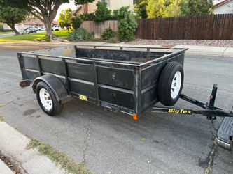 good conditions 2004 big tex utility trailer. Good tires new tail lights. 10'x5'