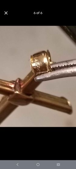 10 karat Solid gold Figaro chain and a 14 karat solid gold cross pendant