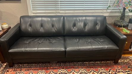 Black Leather Tufted Sofa