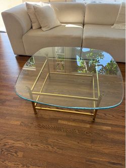 Coffee table, glass top with gold brass base 46”x46” $150 OBO