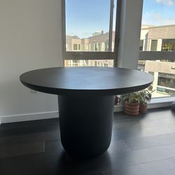 CB2 Round Concrete Dining Table