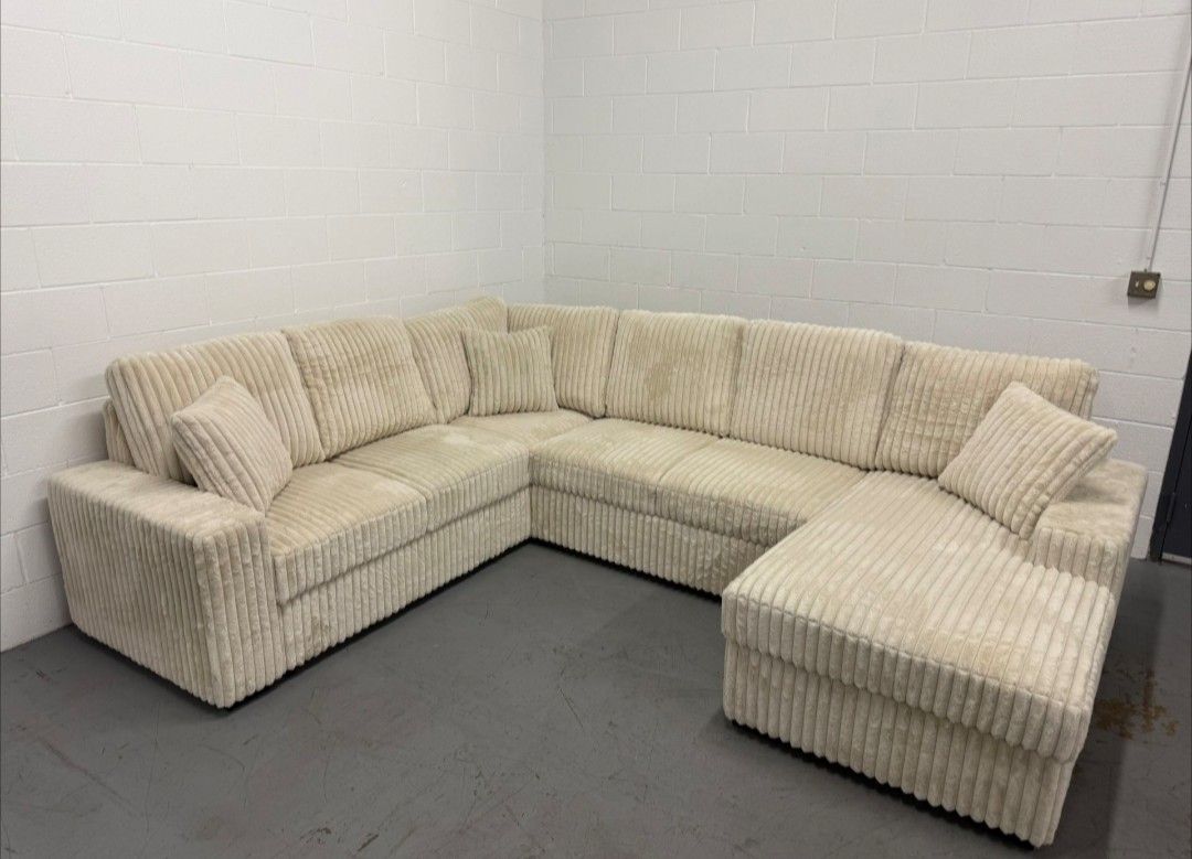 large, U-shaped sectional sofa Cream Color