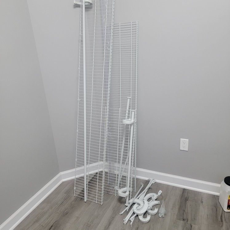 Steel Closet Shelves And Rods And Plastic Hangers