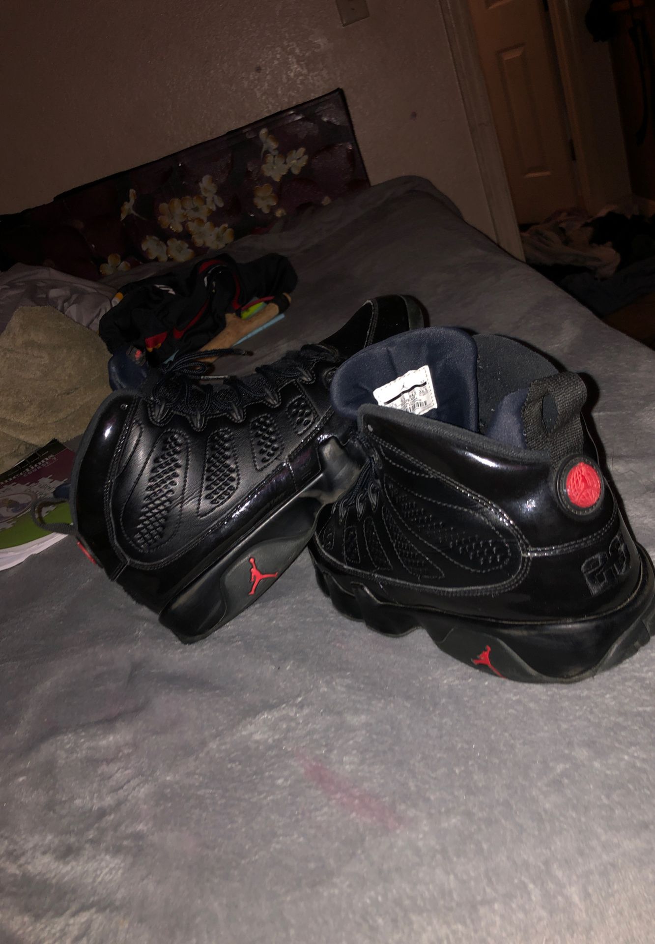 Black and red Jordan 9s