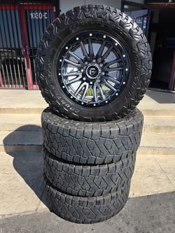 20" FUEL REBEL GREY w/  37"" Toyo RT Trail