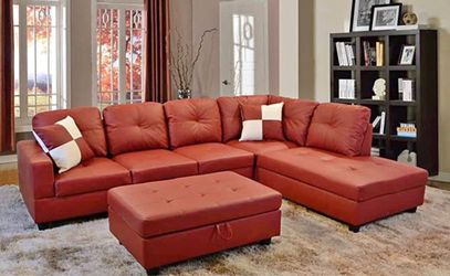 Red leather sectional couch and ottoman
