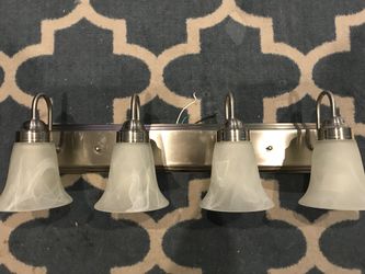 Brushed nickel vanity light