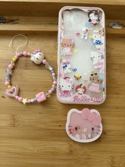 HELLO KITTY IPHONE 17 PROMAX COVER ALONG WITH KITTY HOLDER AND ACCESSORY