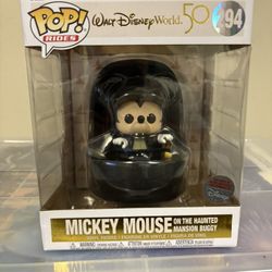 Mickey Mouse on the Haunted Mansion Buggy