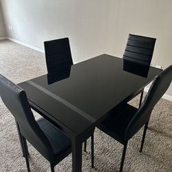 Black Glass Dining Table (Chairs Not Included)