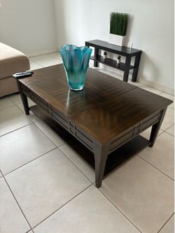 Coffee table with hidden compartments