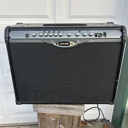 Line 6 Spider II 75 watt guitar amp with many on board effects/modeling in good shape.  This thing is way too huge and powerful for my needs. Definite