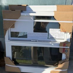 New Lawson 24x24 Hurricane Impact window single hung white clear glass.