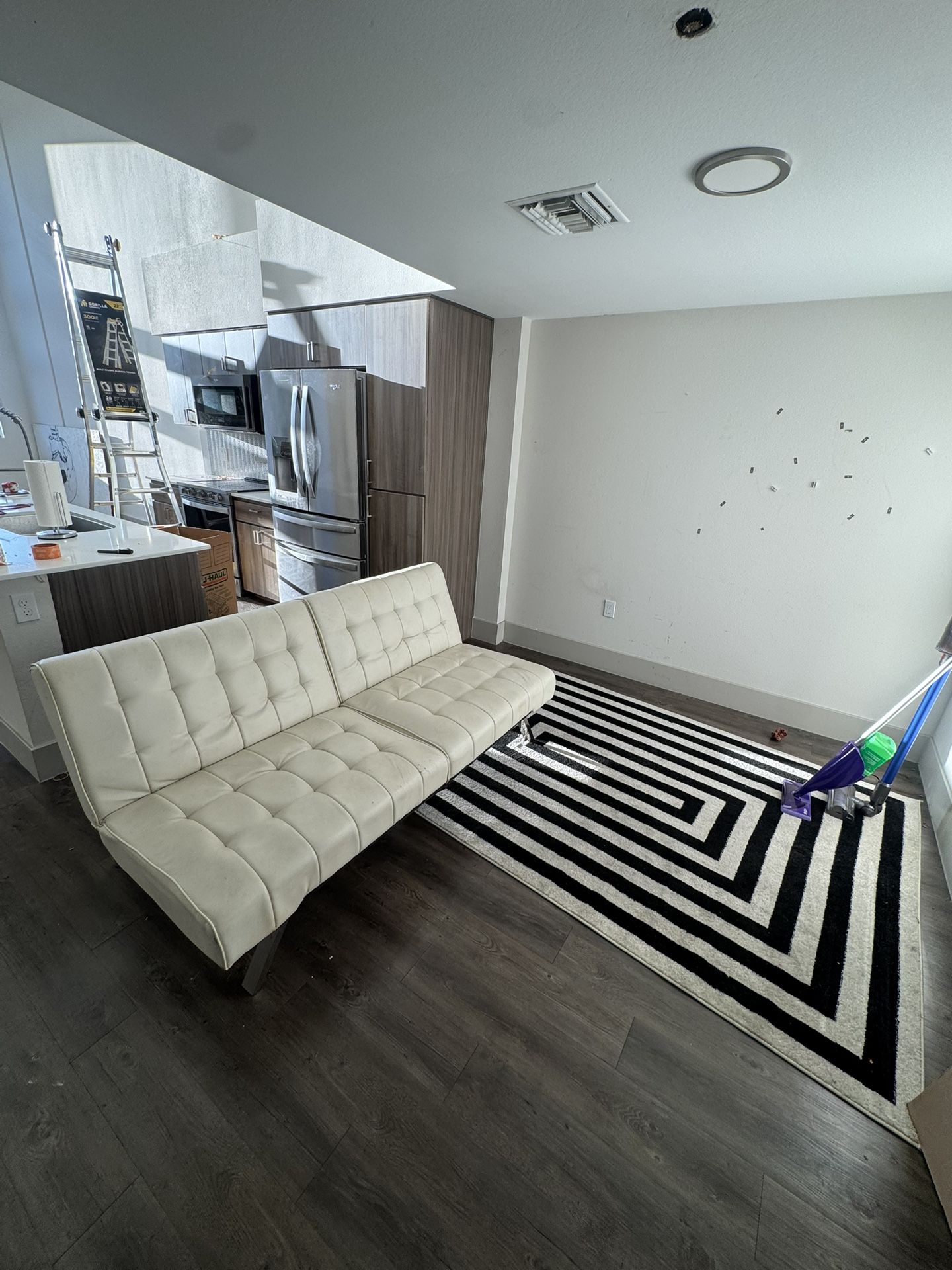 Off White futon & Rug