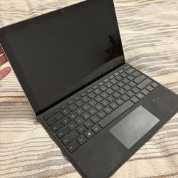 1 iPad, 1 Microsoft Tablet 