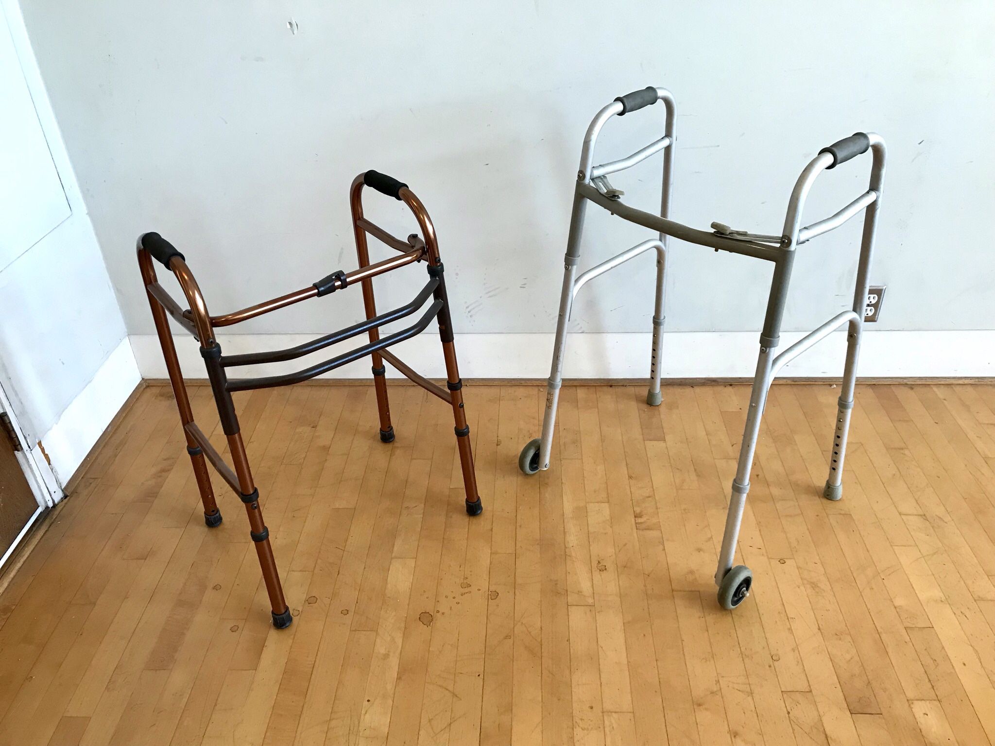 2 Adult Walkers Adjustable Aluminum lightweight folding one with wheels great condition $20 Each in Ontario 91762