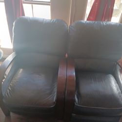 2 Black leather and wood recycling chairs