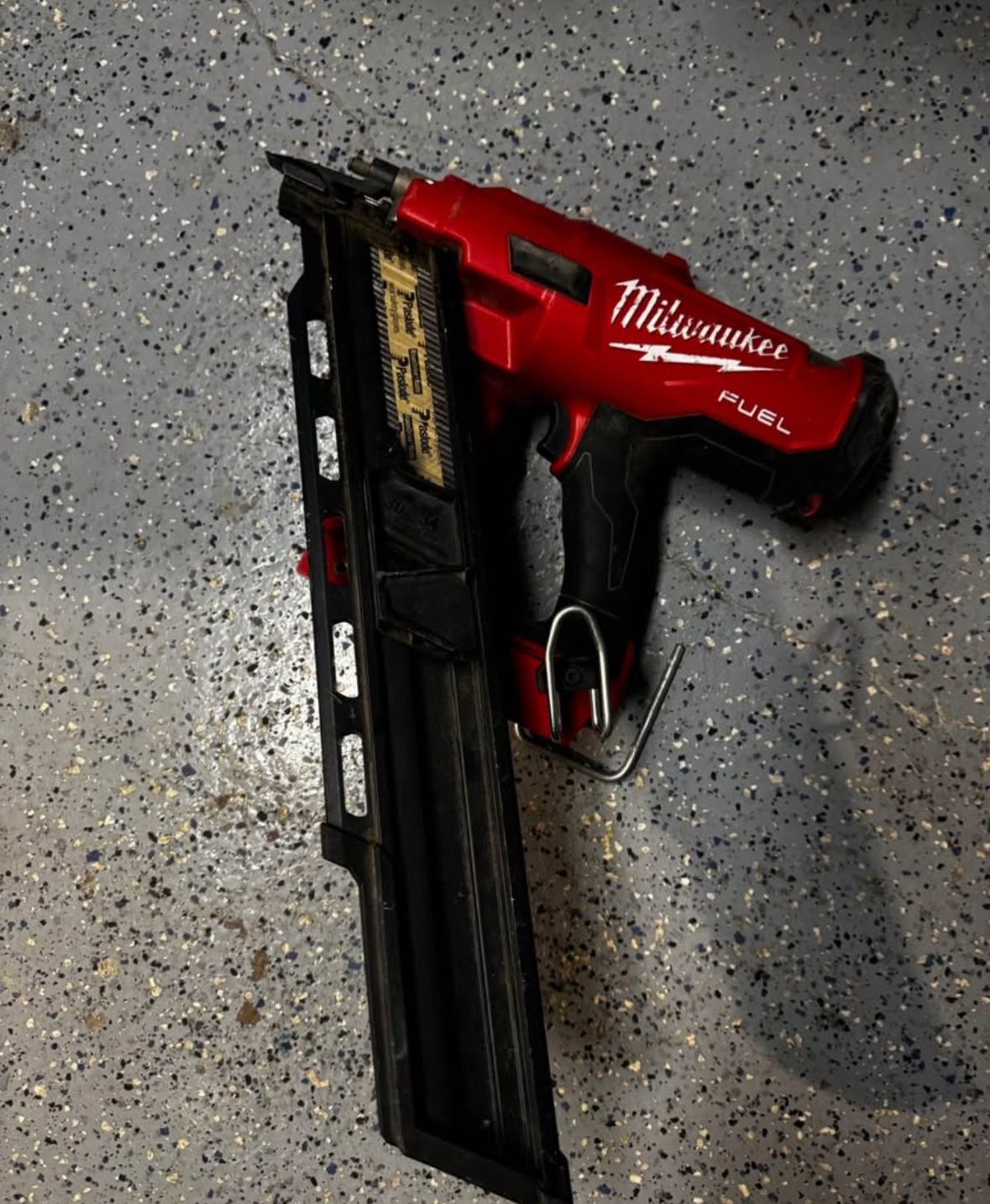 Milwaukee m18 30 degree framing nailer with extended clip.