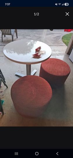 2 Red soft ottoman chairs