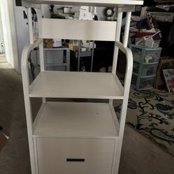 Three Shelves. One  Drawer Rolling Cart