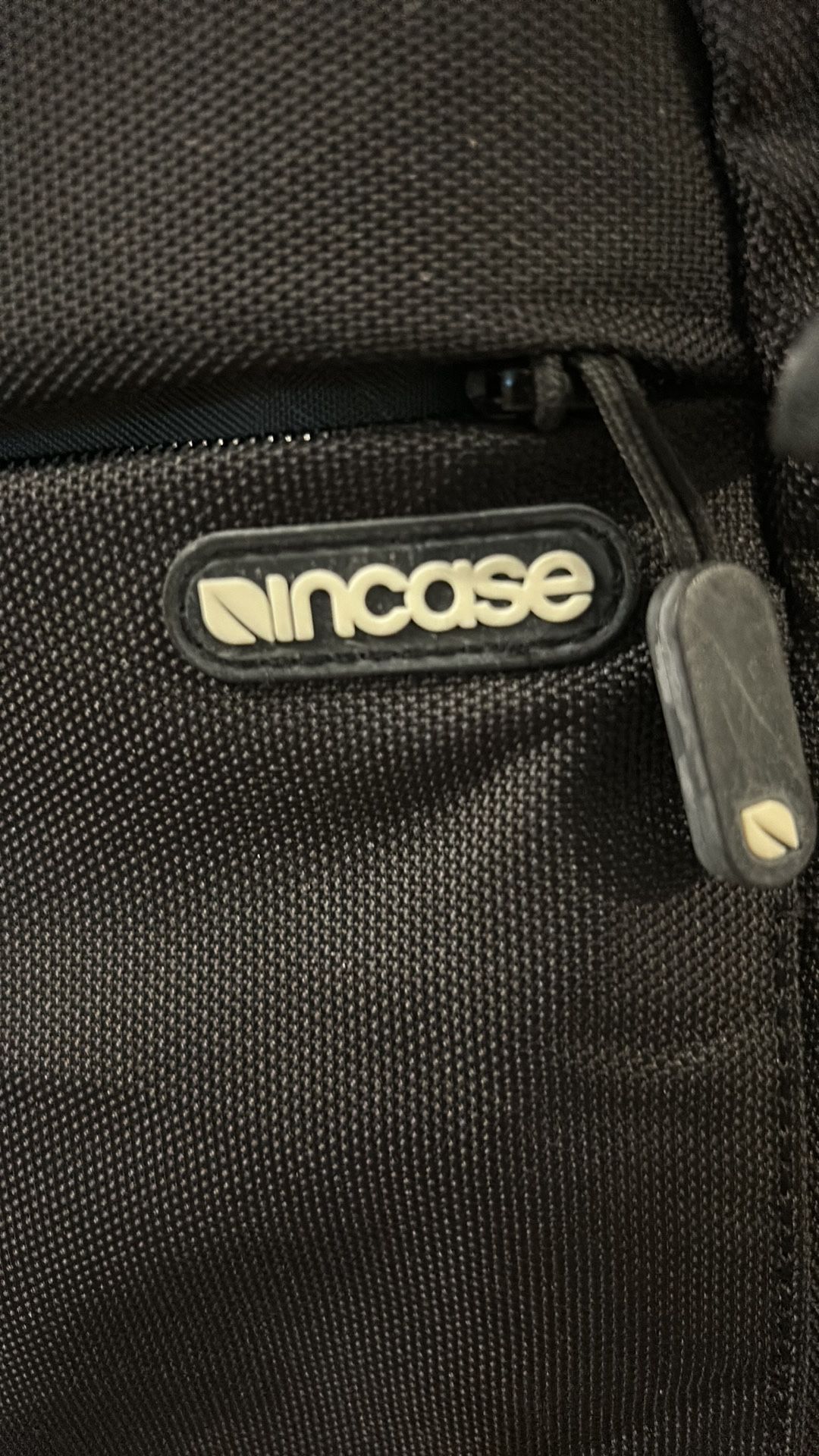 incase Bag: Black, Multiple Pockets, Adjustable & Removable Strap