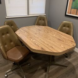Mid Century Kitchen Dining Table With Four Leather Swivel And Rolling Caster Chairs