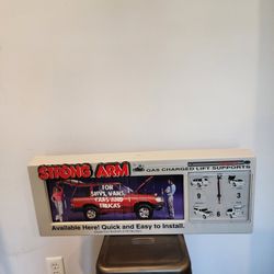 VINTAGE NEW Strong Arm Wall Motion Sign w/ Clock, Battery Operated, Strong Arm 