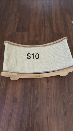 cat scratching post and small cat house