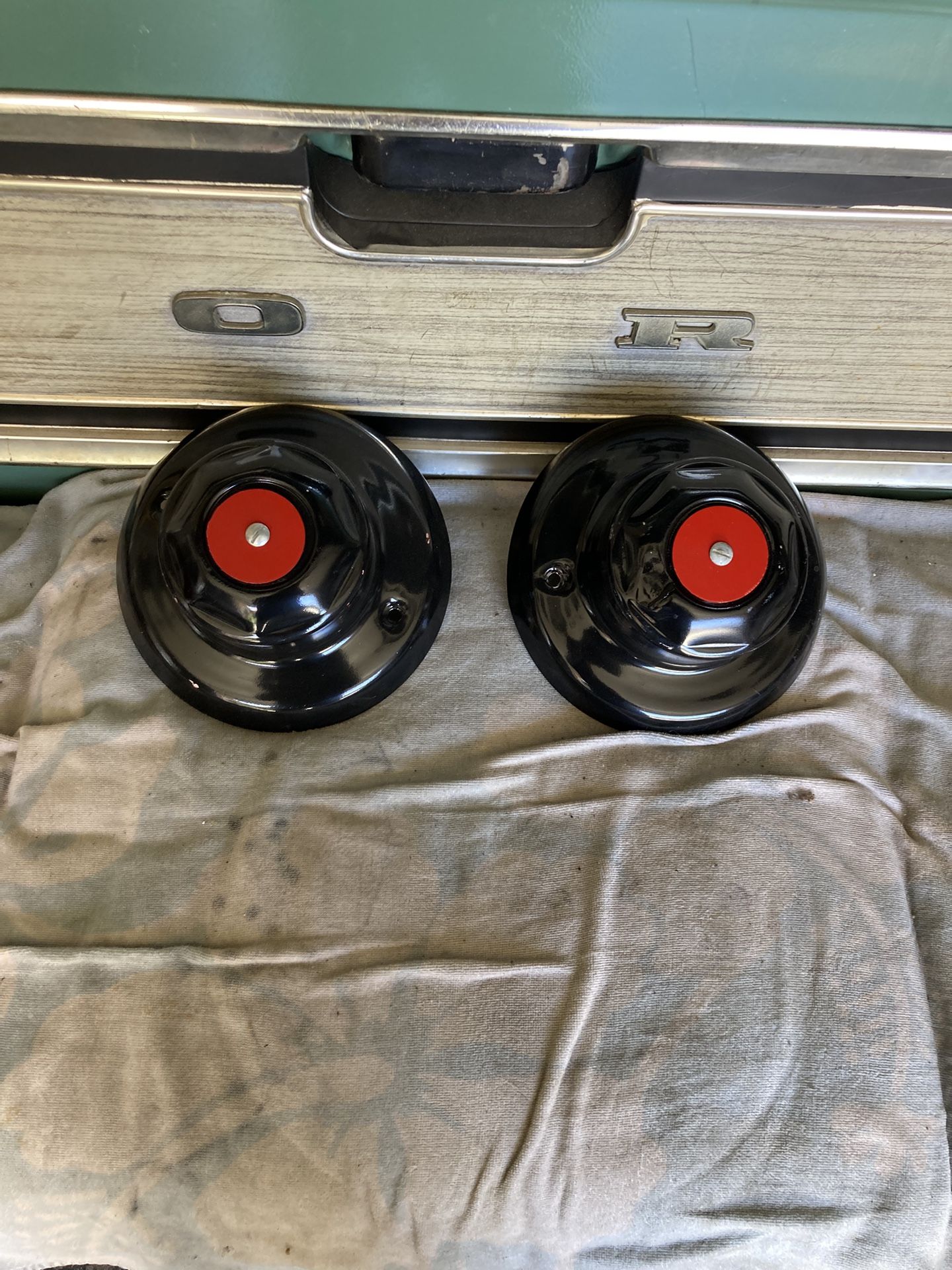 Two center caps for weld 16 inch rims.