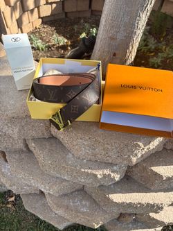 Lv belt and a lv cologne